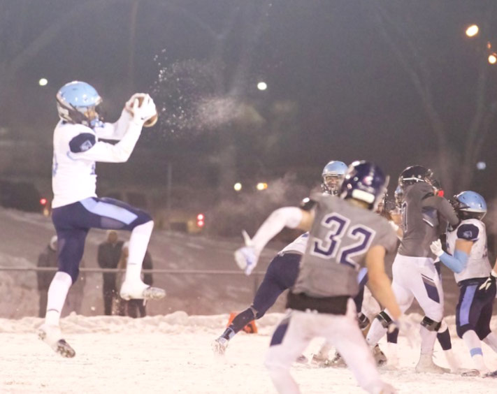 Cam playing football